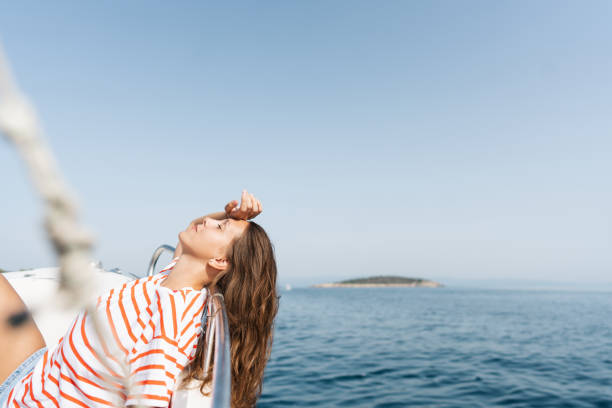 istock Enjoying summer day on the boat 1365362589