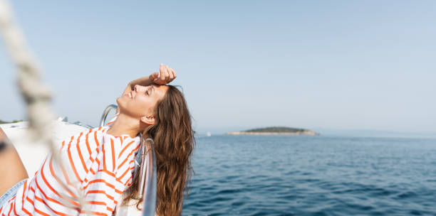 istock Enjoying summer day on the boat 1365363200