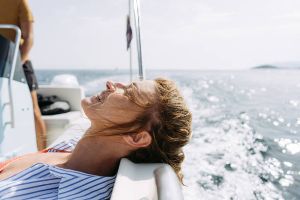 istock Enjoying summer day on the boat 1365363462