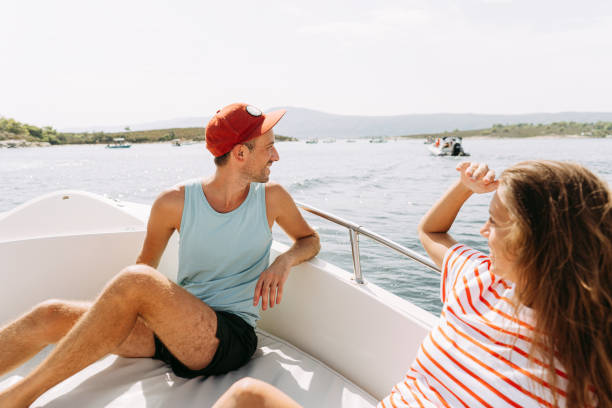 istock Couple taking a boat ride on the sea 1365363670