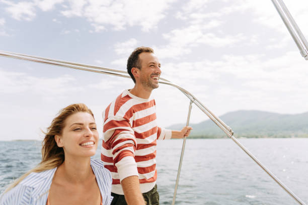 istock Couple taking a boat ride on the sea 1365364109