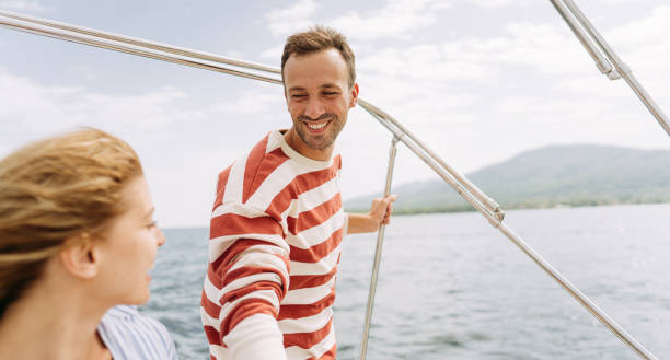 istock Couple taking a boat ride on the sea 1365364156