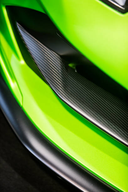 istock Exotic car's front bumper, with carbon fiber elements 1365367737