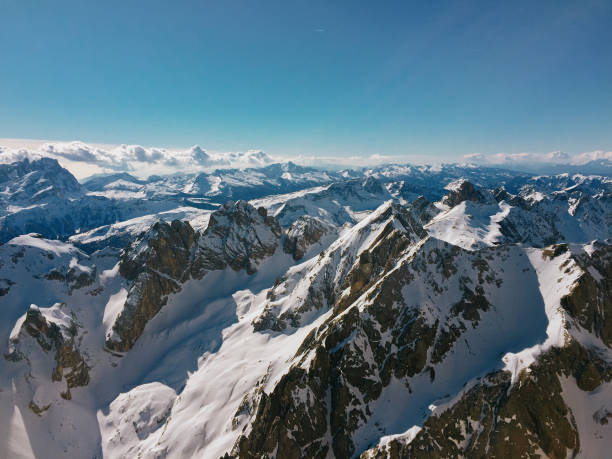 istock Snowy valley and mountains in winter 1365368370