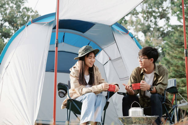 istock Happy couple camping life at park 1365368476