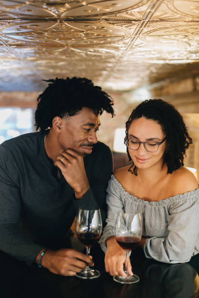 Couple drinking wine stock photo