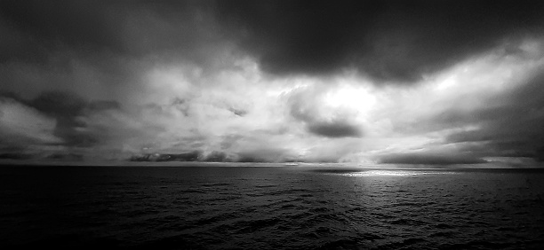 Black and white over calms seas