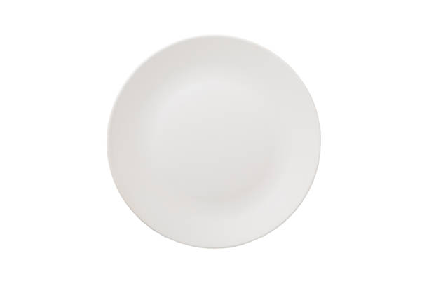 istock White ceramic round plate isolated over white background. Top view 1365374256