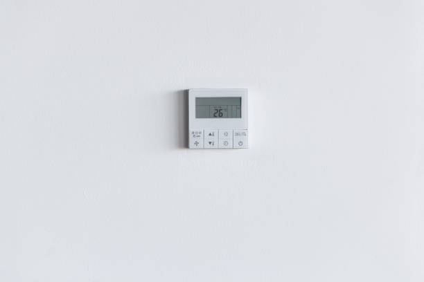 istock The air conditioning and heating control panel for the apartment and office is located on a white wall 1365376080