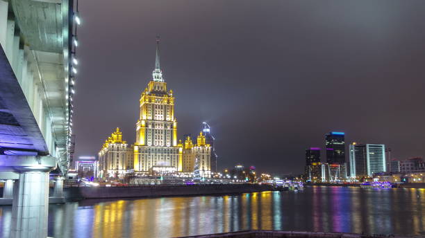 istock Hotel Ukraine winter night timelapse with bridge over Moscow River 1365376754