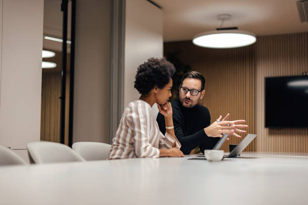 istock Serious business partners, figuring out their next step in the future business. 1365384412