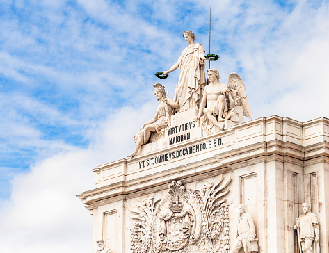 A close-up of the triumphal statues on the Rua Augusta Arch, in Lisbon's imposing Praça do Comércio square.