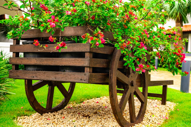istock decorative wooden cart with flowers 1365384917