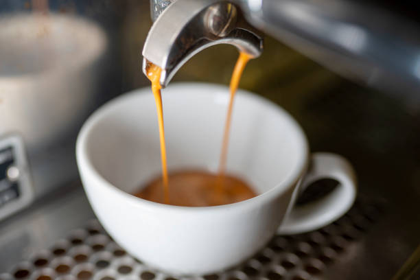 istock Espresso Machine Pulling a Shot in white mug stock photo 1365390922