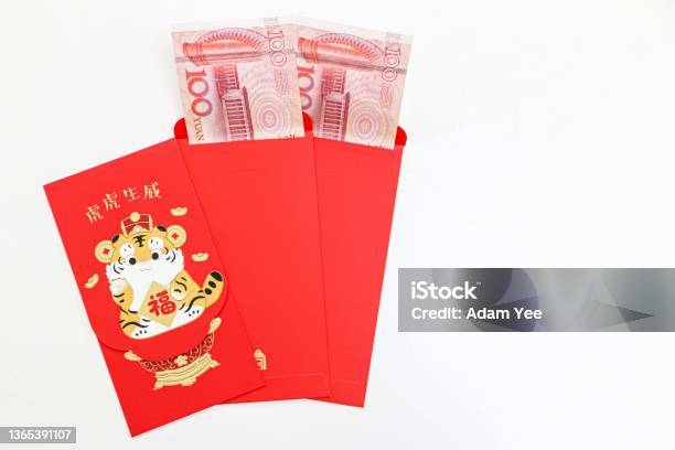 Chinese New Year Lucky Red Envelopes For Tiger Year With 100 Chinese Yuan Notes Inside Chinese Greeting Text Translates As Blessing With Vigour And Vitality Of A Tiger Stock Photo - Download Image Now