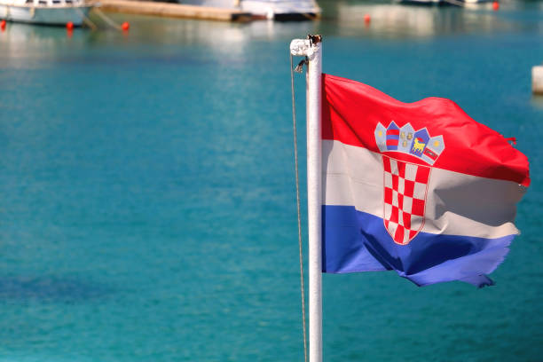 istock Croatian Flag and Adriatic Sea 1365391780