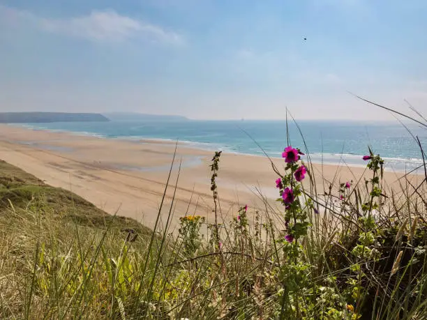 Perranporth is a huge Cornish beach, with soft golden sand and clifftop walking routes.