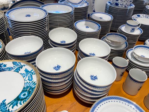 istock Various plates and mugs of retro dinnerware with blue florals. 1365398437
