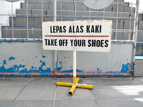 warning signs with lettering Indonesian 