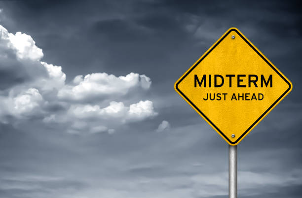 Midterm just ahead - information road sign Midterm just ahead - information road sign midterm election photos stock pictures, royalty-free photos & images