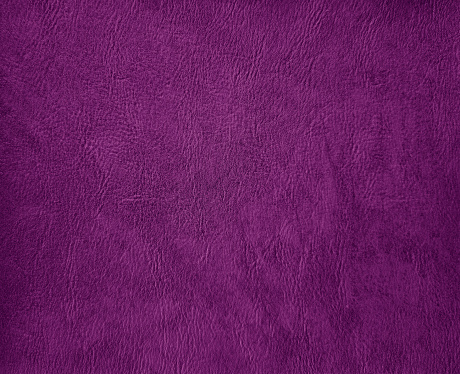 vintage purple faux leather. violet artificial leather background for luxury, elegant and classic concept. plain background of purple leather in close-up view.