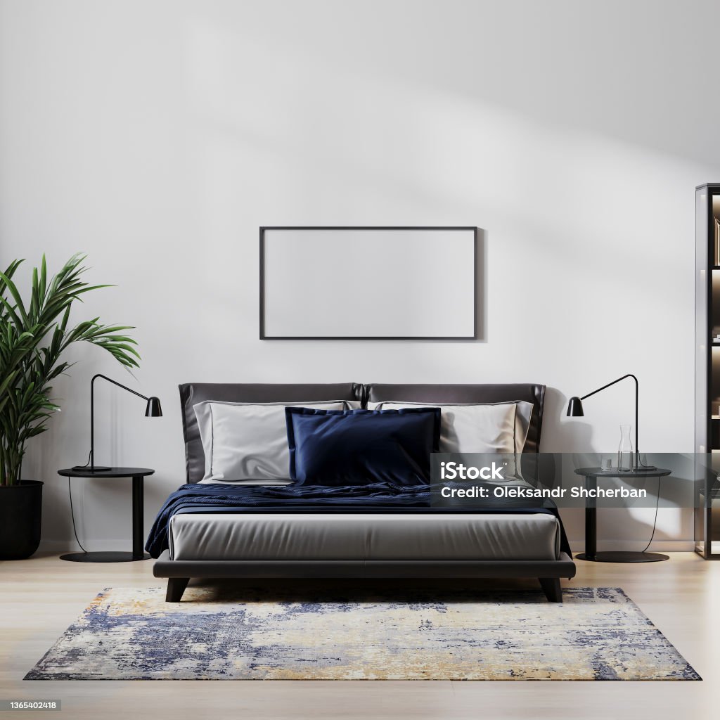 picture frame mock up in home bedroom interio with bed and dark blue pillow, bedside tables, plant with white wall, 3d illustration Apartment Stock Photo