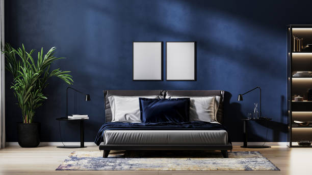 istock poster frames mock up in modern bedroom interior background with empty dark blue wall, 3d rendering 1365402454