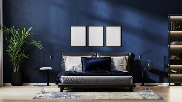 istock poster frames mock up in modern bedroom interior background with empty dark blue wall, 3d rendering 1365402510