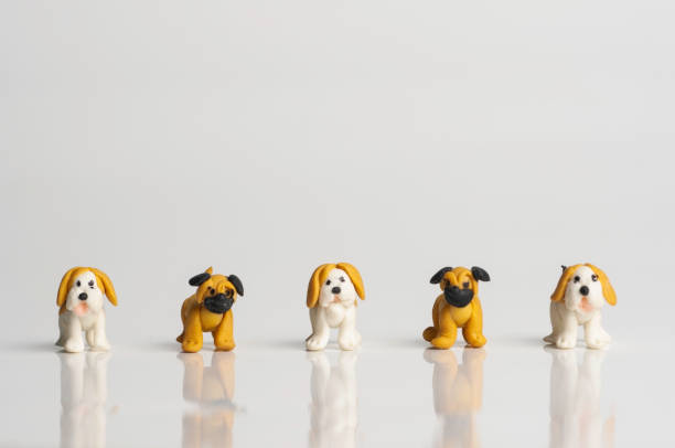 istock Miniature dog puppy, beagle pug dog standing. 1365404154