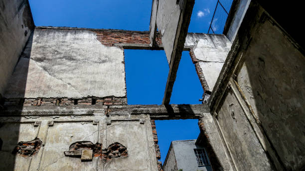 istock Closed shot of a building in ruins 1365406354