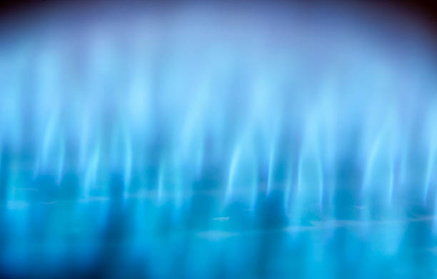 Blue flames Close-up view of blue flames in gas boiler butane photos stock pictures, royalty-free photos & images