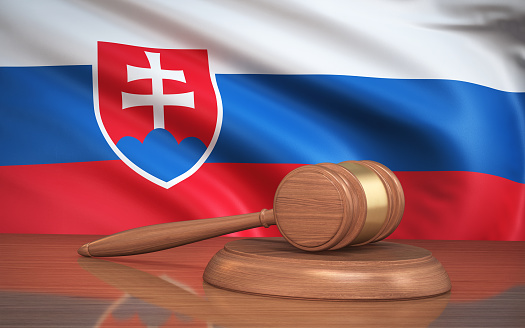 3d Render Judge Gavel and Slovakia Leone flag on background (close-up)