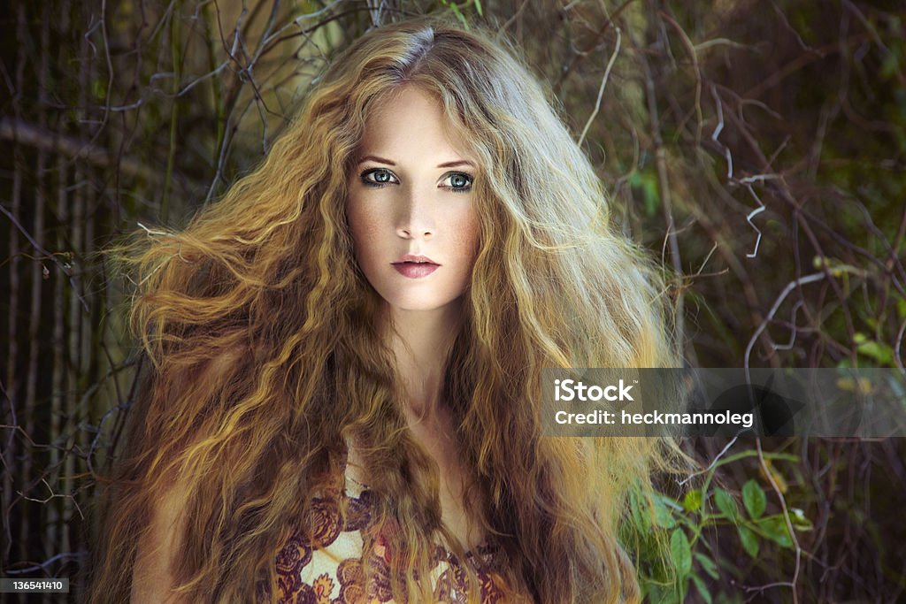 Fashion portrait of young sensual woman Fashion portrait of young sensual woman in garden 20-29 Years Stock Photo