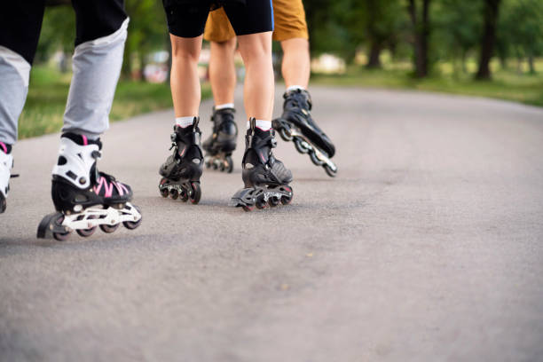 istock A group of unrecognizable people roller-skating on the trail 1365417913