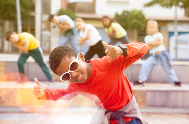 istock Boy hip hop dancer exercising outdoors 1365421187