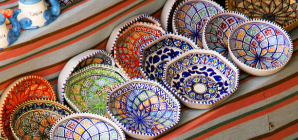 Gateway to the Sahara Desert Tunisia is an attractive, historical, and exotic country in North Africa, between the Mediterranean Sea and the Sahara Desert. In addition to attractive nature, picturesque markets, and many tourist attractions in Tunisia, filming for the original Star Wars movie first began in March 1976 in Tunisia near the Sahara Desert. homemade pottery wheel stock pictures, royalty-free photos & images