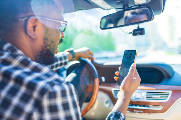 istock Stylishly dressed young African man and luxury vehicle 1365421582