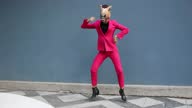 istock Woman with the horse head dancing 1365421674