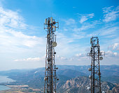 istock Cell phone or mobile service towers 1365425040