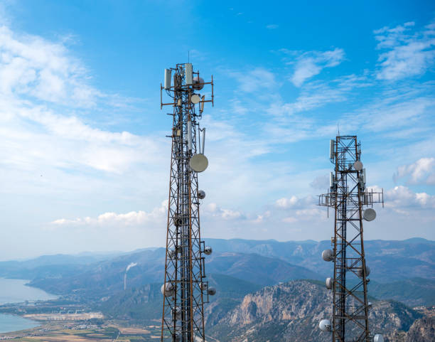 Cell phone or mobile service towers Cell phone or mobile service towers telecommunications equipment stock pictures, royalty-free photos & images