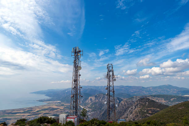 istock Cell phone or mobile service towers 1365425165