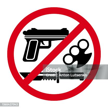 istock No weapons sign with red round and symbols of knife, gun and brass knuckles 1365427043