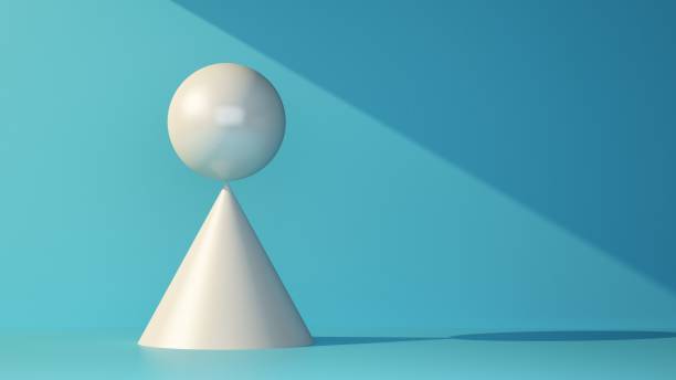 istock sphere balances on the tip of the cone 1365427107