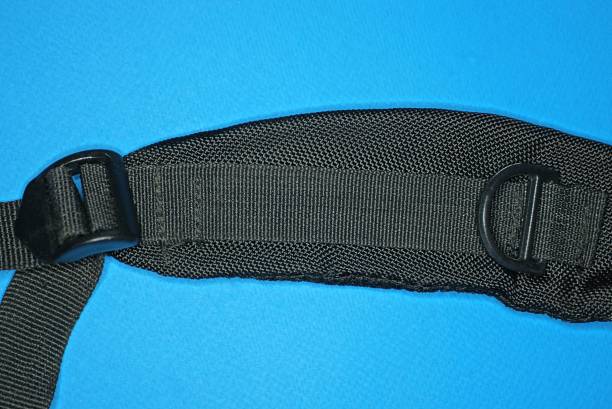 istock a black fabric backpack harness with a plastic carabiner 1365427985