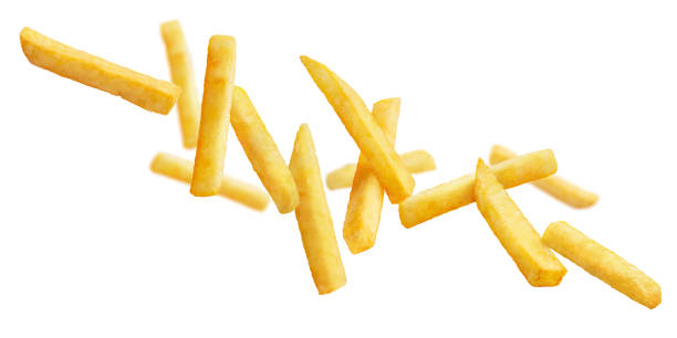 istock Flying delicious potato fries on white 1365428214