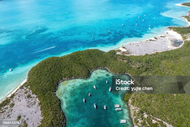 Aerial View Of Anchored Sailing Yacht In Emerald Caribbean Sea Stocking Island Great Exuma Bahamas Stock Photo - Download Image Now