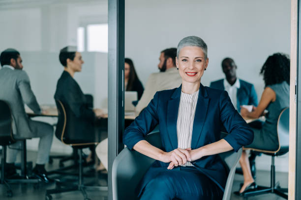 istock Successful businesswoman in the office. 1365436070