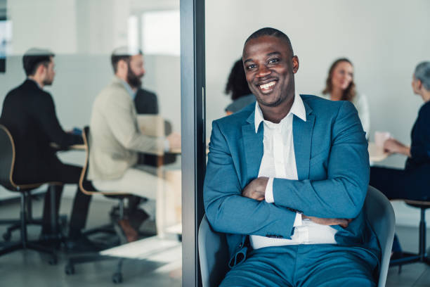 istock Successful businessman in the office. 1365436071