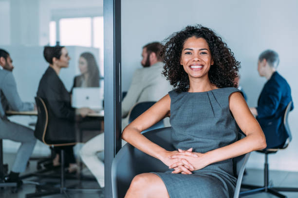 istock Successful businesswoman in the office. 1365436554