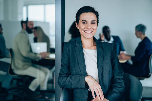 istock Successful businesswoman in the office. 1365436728